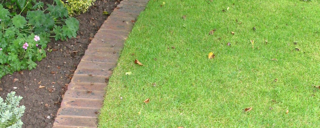 Make your lawn easier to maintain with brick edging